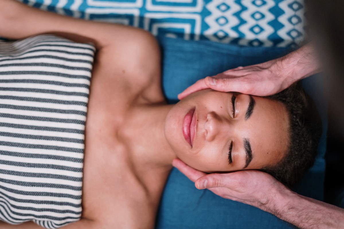 Image of massage therapy - A lady receiving massage therapy